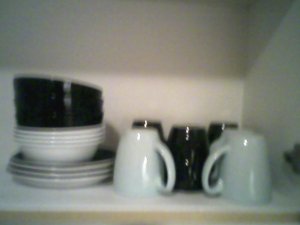 The light dishes are Corelle ones my sister gave me.  The black ones were given to me by the lady who moved out of the next door apartment.